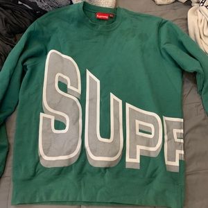 SS18 Supreme Side Arc Crewneck